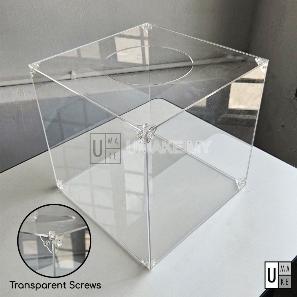 Clear acrylic lucky draw box with a round hole on top, held together with transparent screws